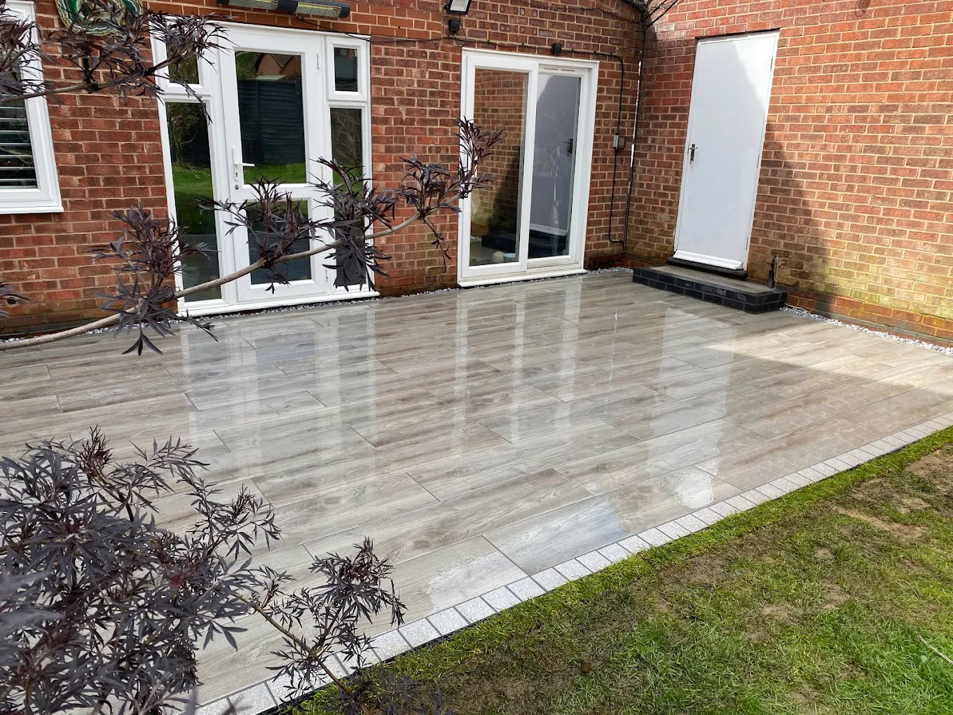 Porcelain patio with bi-fold doors